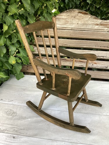 One wooden rocking - one, for